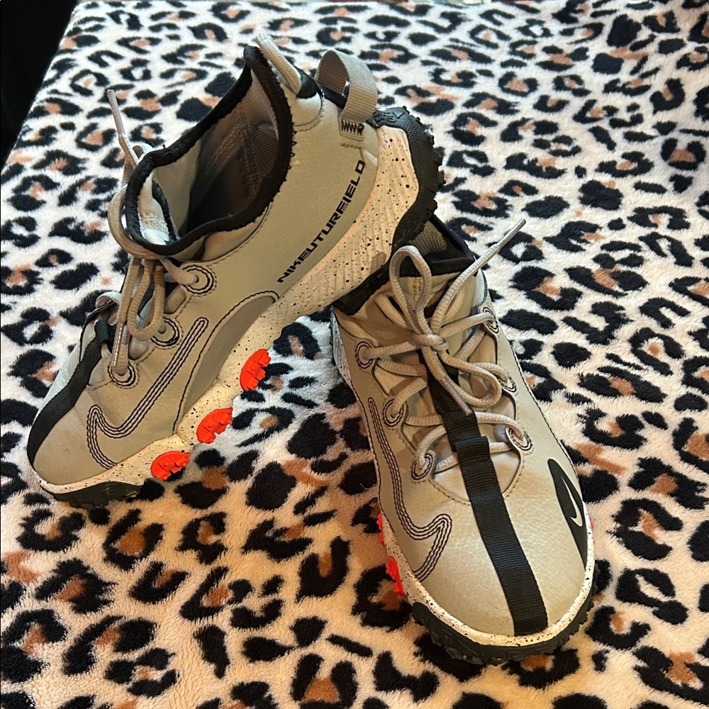 Nike Future Field youth Shoes with Black and Orange Highlights